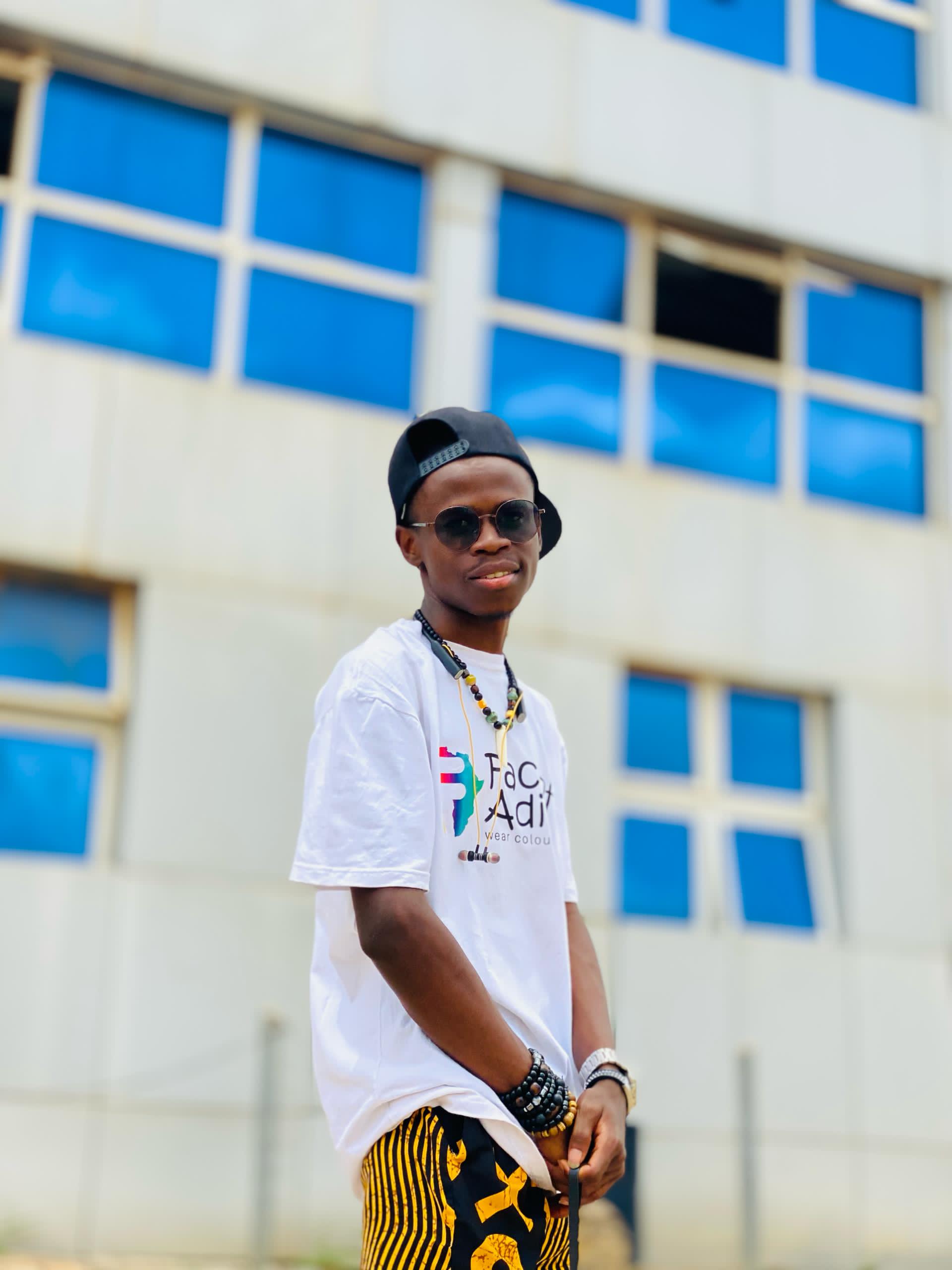 Face of Adire White Round Neck T-Shirt with Colorful Logo